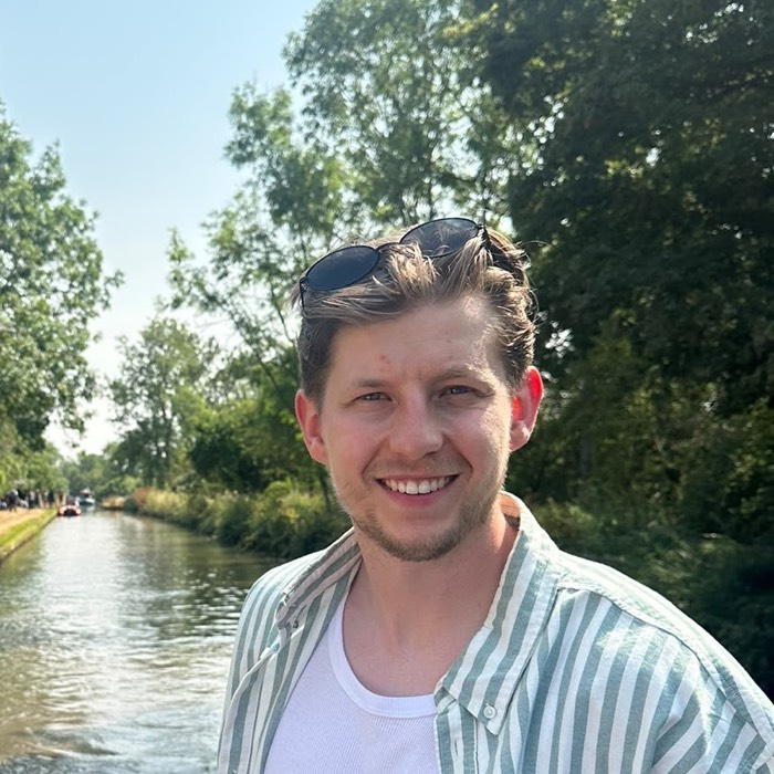 Jake Avery smiling on a canal boat
